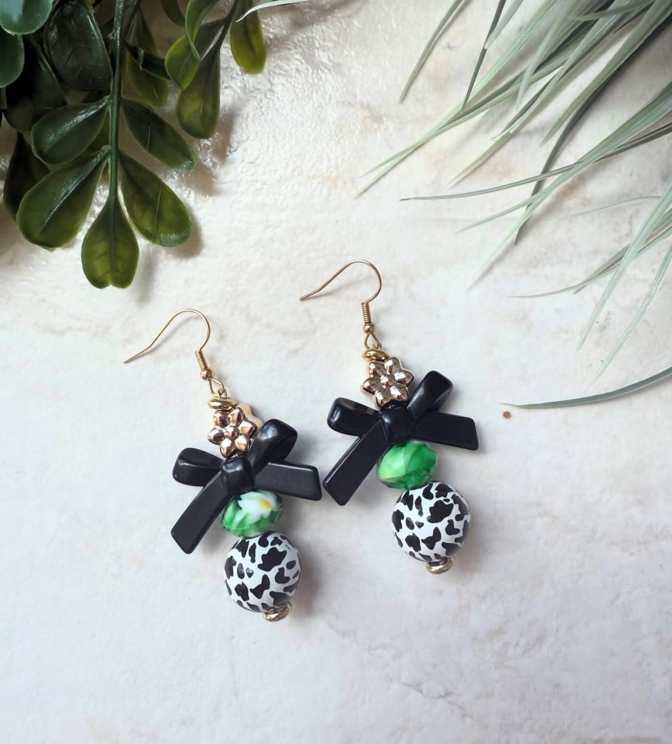 Green bow dangles