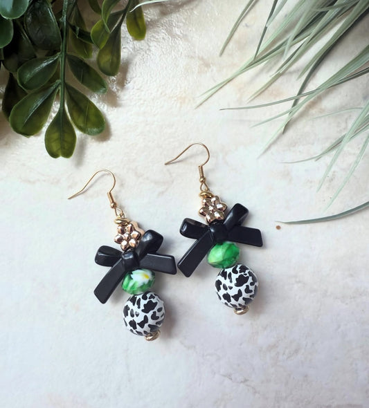 Green bow dangles